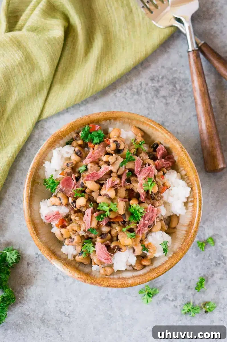 caroline peas and rice in a bowl next to a towel