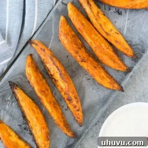 roasted sweet potato slices on a board, styled for a recipe card