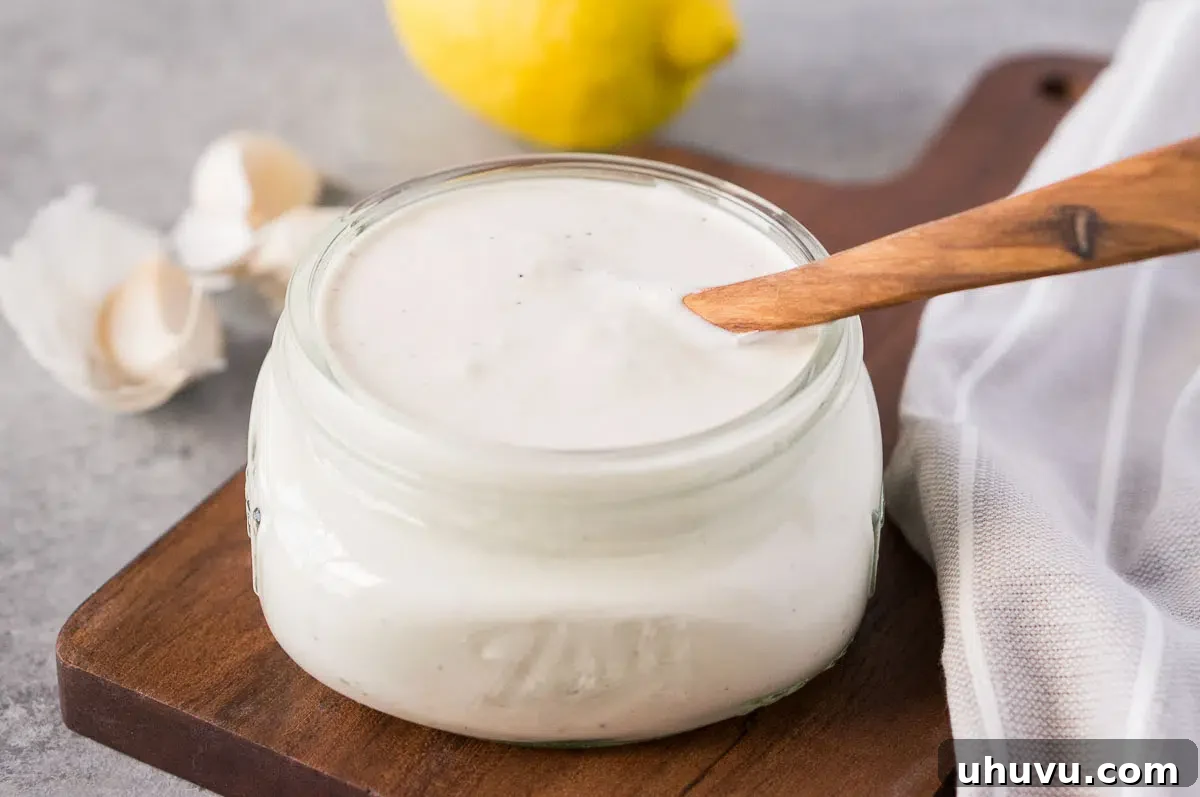 homemade garlic aioli stored in a jar