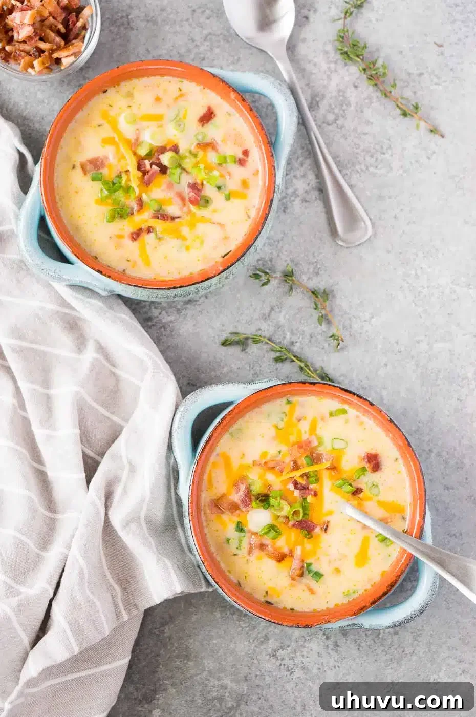 two bowls with loaded potato soup