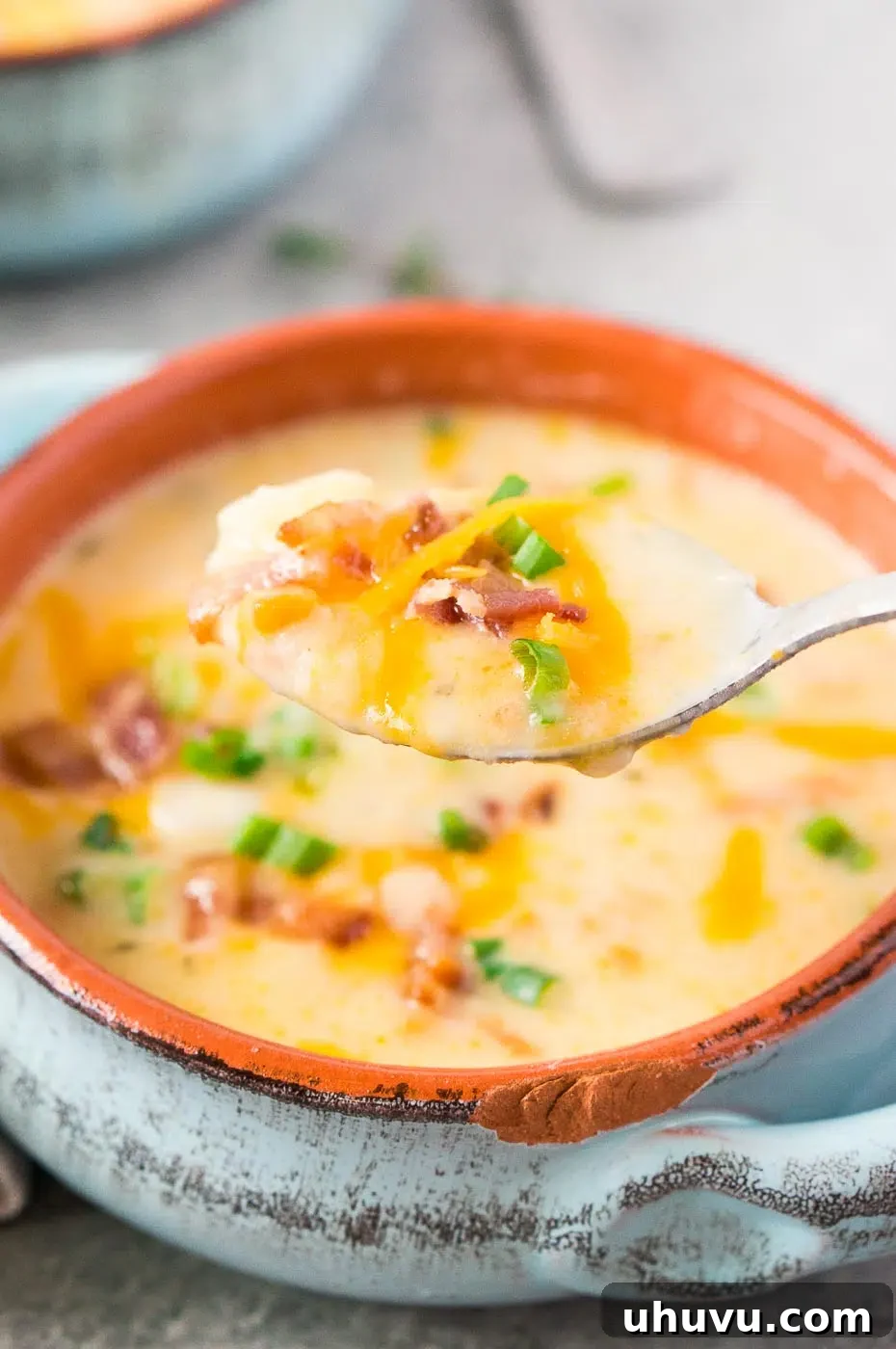 taking a spoonful of soup