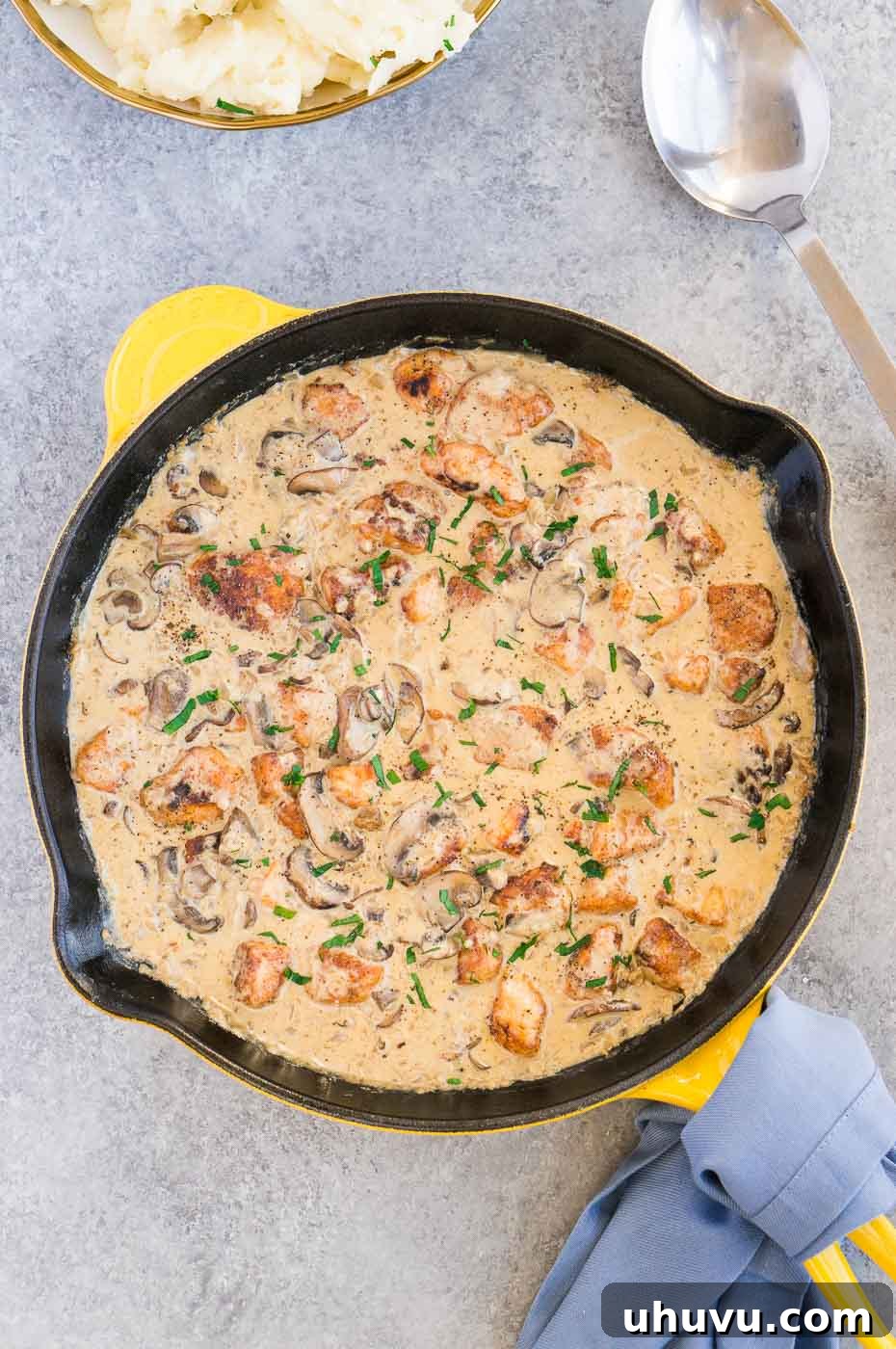 Creamy Chicken Stroganoff 6 Hearty and healthy chicken stroganoff cooking in a large skillet, bubbling with creamy goodness and ready to be served.