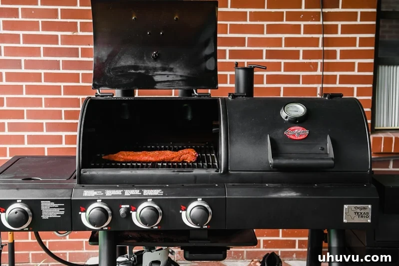 A pork tenderloin on a Char-Griller grill.