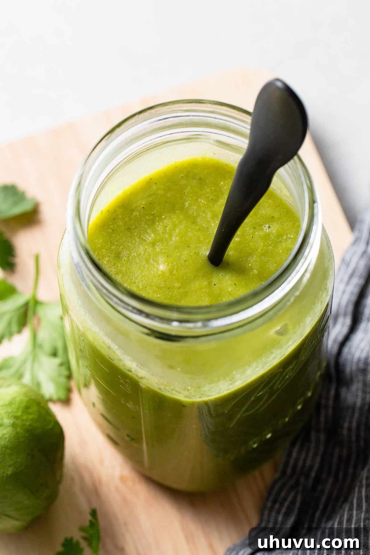Zesty Green Enchilada Sauce 2 Green enchilada sauce stored in a jar, ready for use