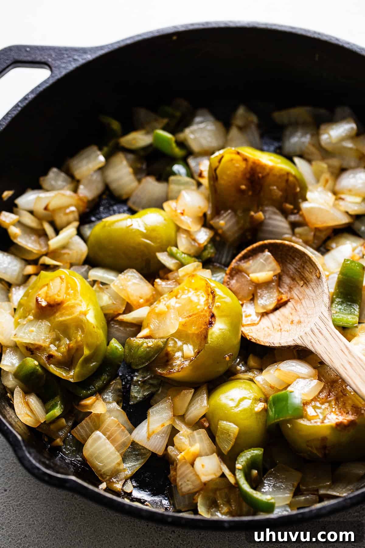 Zesty Green Enchilada Sauce 5 Sautéed tomatillos, onions, jalapeños, and garlic in a skillet