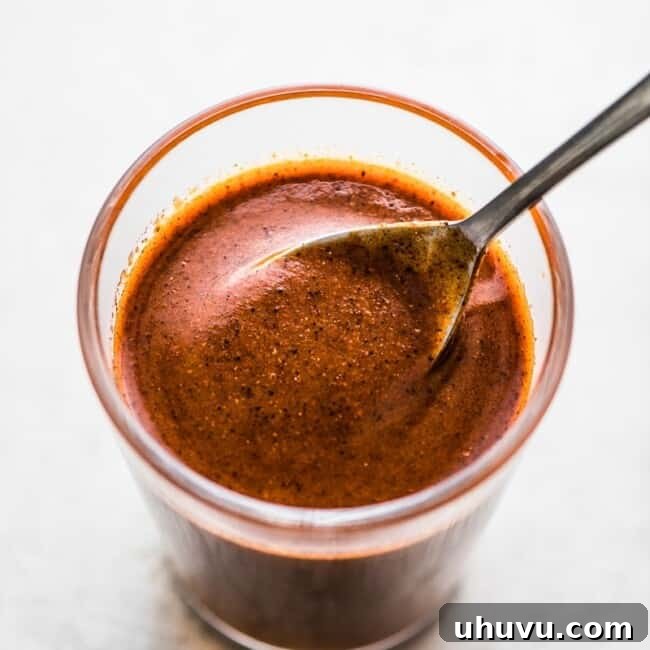 Ready in only 10 minutes, this easy enchilada sauce is super simple to make and requires no dried chiles! Made with chile powder, tomato paste and more. #enchiladas #mexicanfoodrecipes #mexicanfood #mexicanrecipes