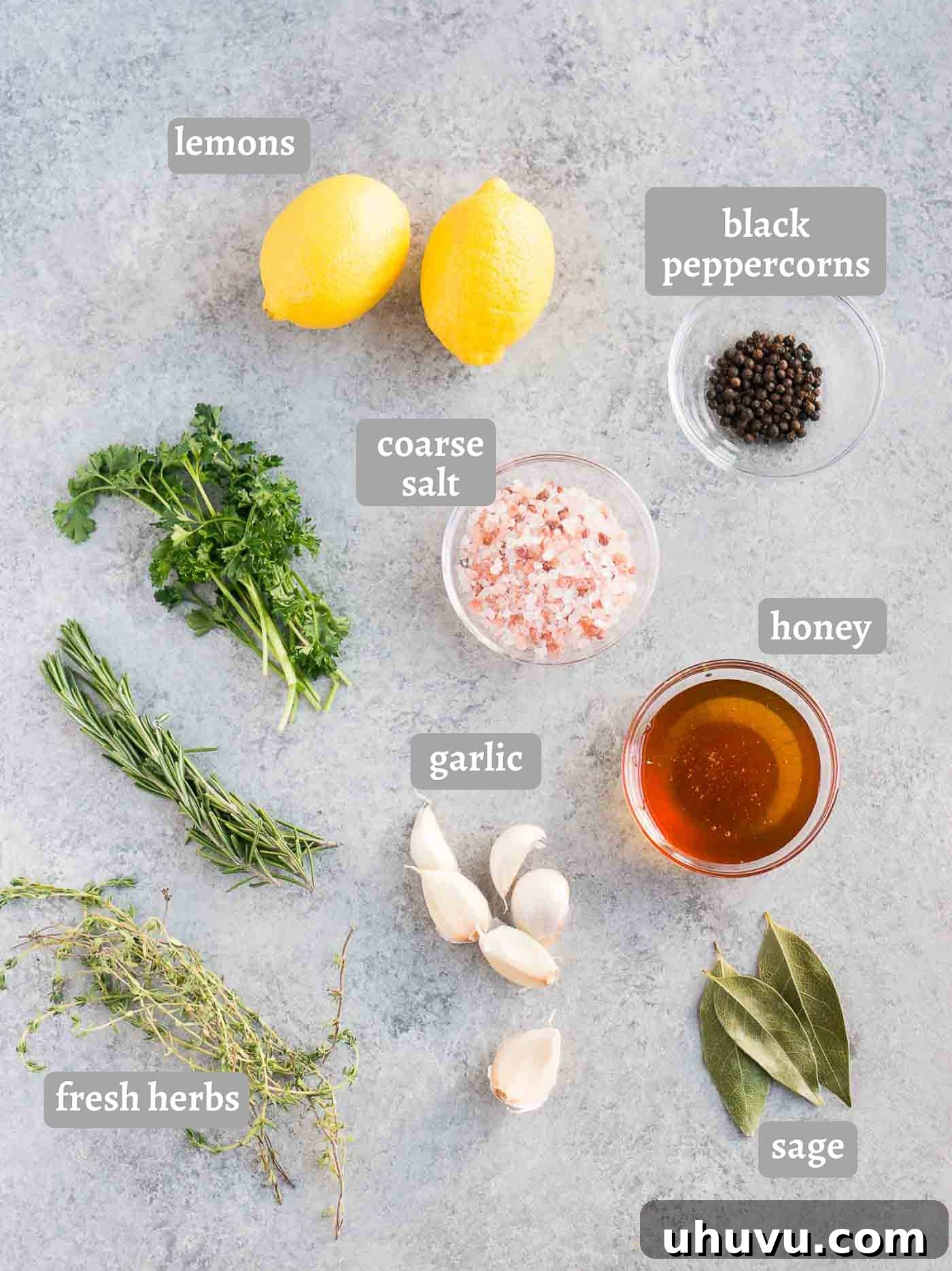 Juicy Chicken Secret 3 Collection of fresh ingredients for wet chicken brine including lemons, herbs, garlic, honey, salt, and peppercorns
