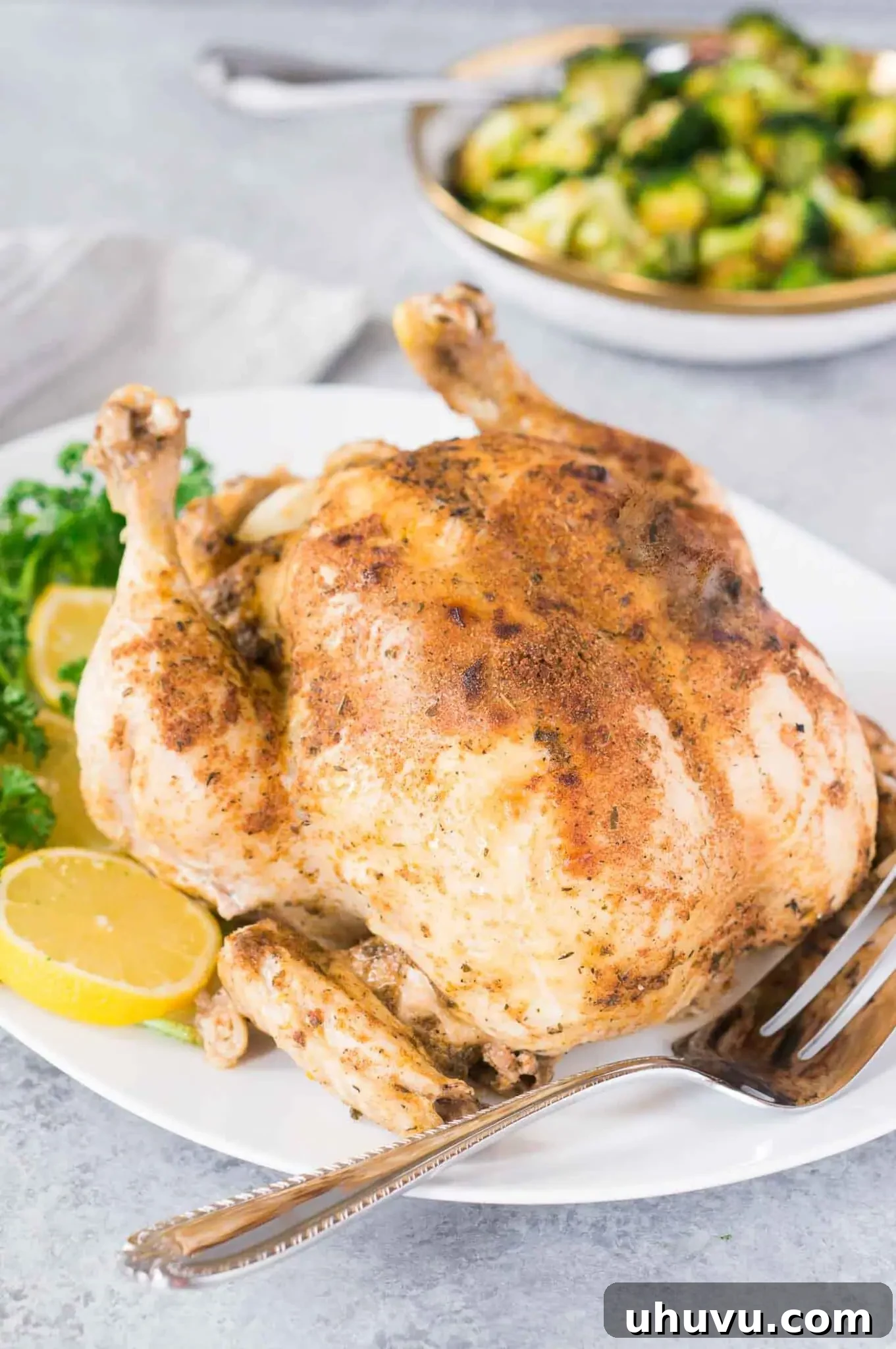 Instant Pot Rotisserie Chicken 2 whole chicken cooked in the instant pot served on a platter