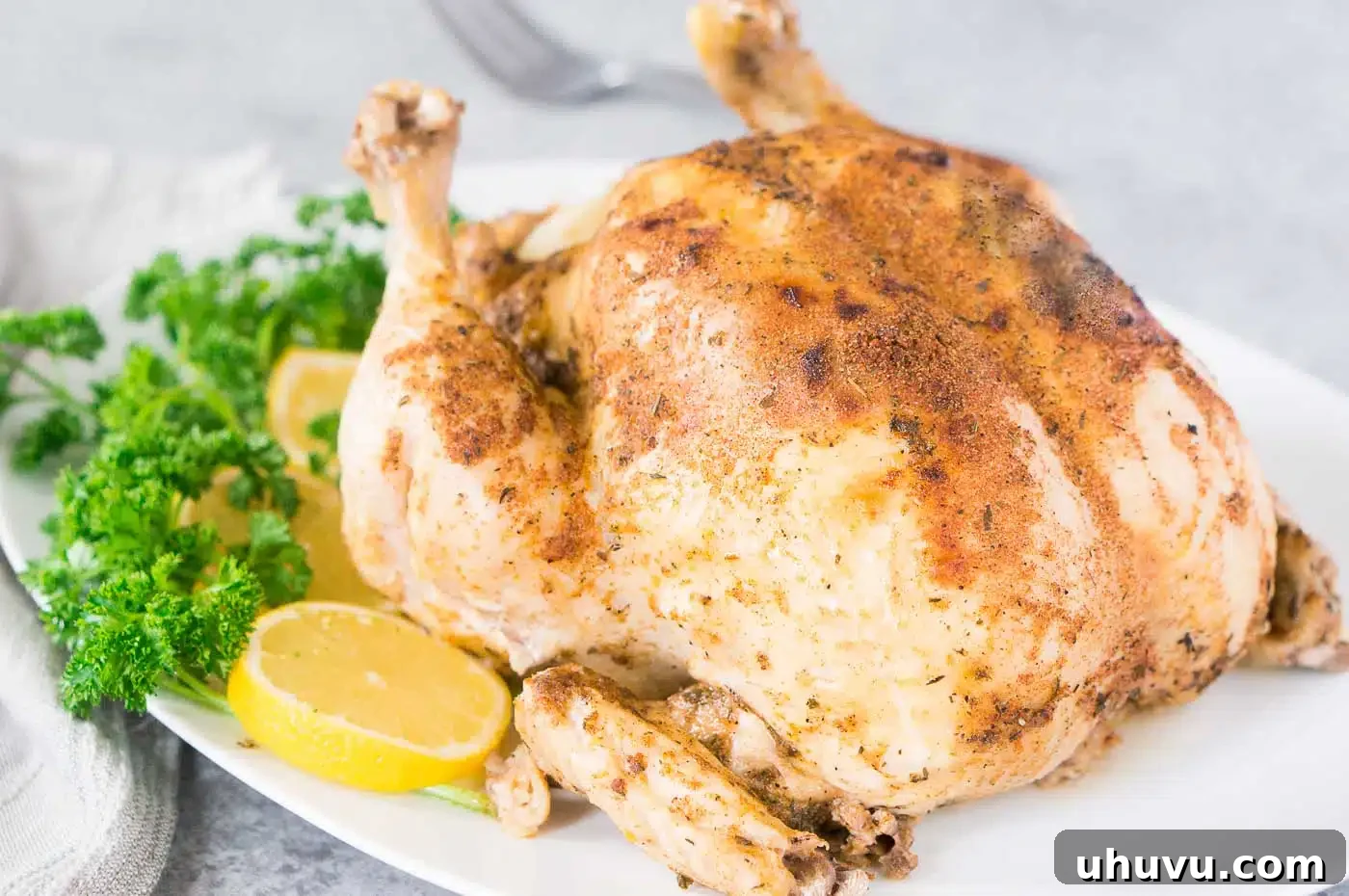 Instant Pot Rotisserie Chicken 3 pressure cooked whole chicken on a platter