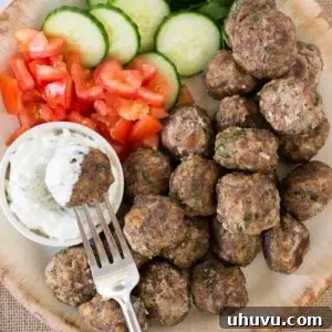 greek meatballs (keftedes) with cucumbers tomatoes and tzatziki sauce