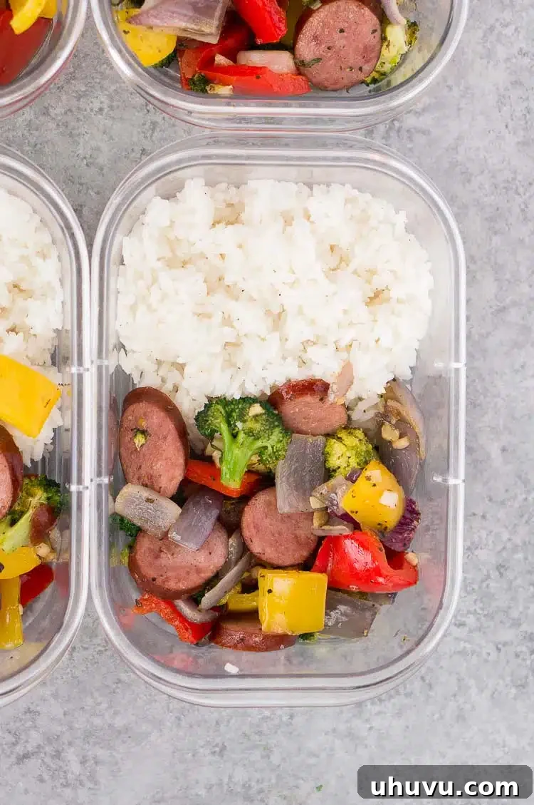 Hearty Roasted Feast 5 Roasted Vegetables and Sausage with Rice in a meal prep bowl, ideal for a balanced lunch or dinner