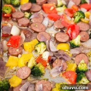 Hearty Roasted Feast 7 A close-up of a serving of roasted vegetables and sausage, illustrating a low carb, keto, paleo, and Whole30 compliant meal