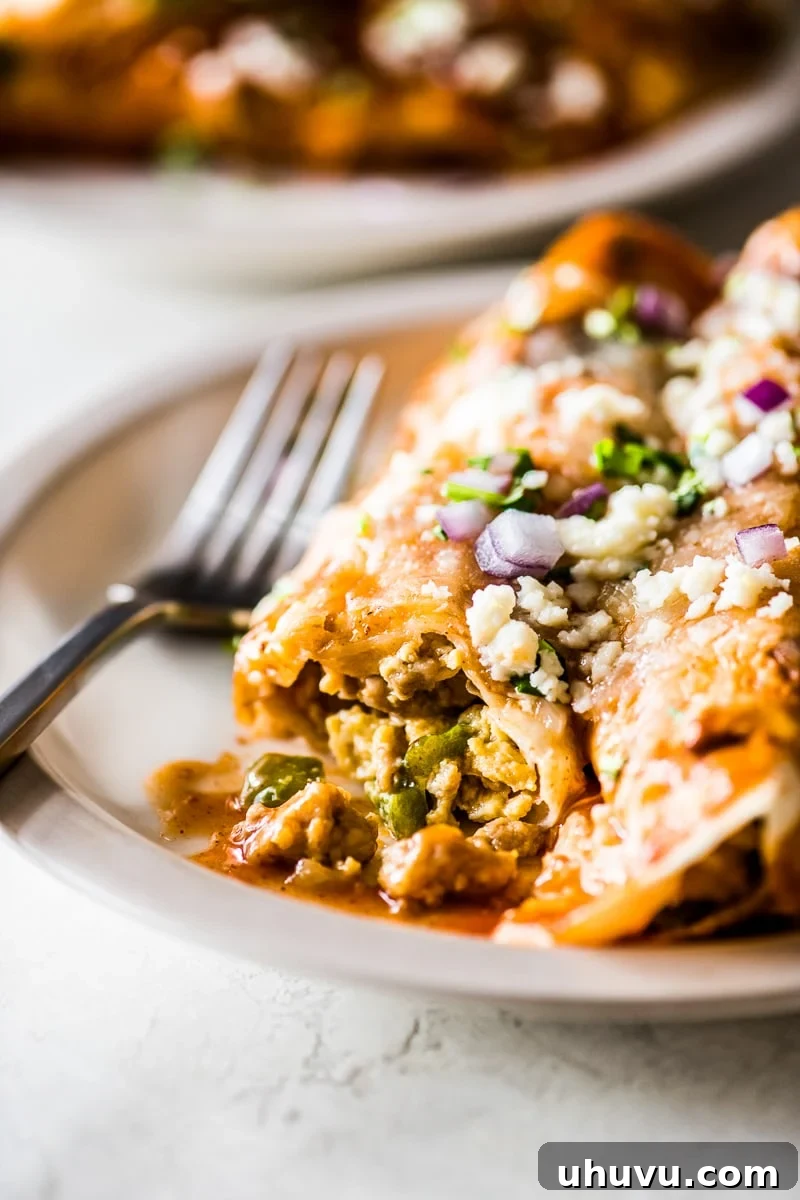 Effortless Morning Enchilada Bake 9 A cross-section view of a breakfast enchilada, revealing its savory filling.