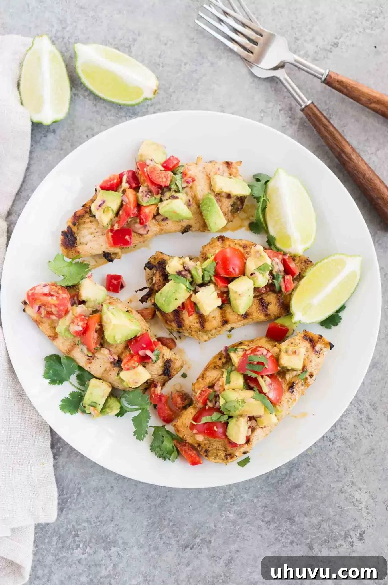 Perfectly cooked cilantro lime chicken on a plate, ready to be served