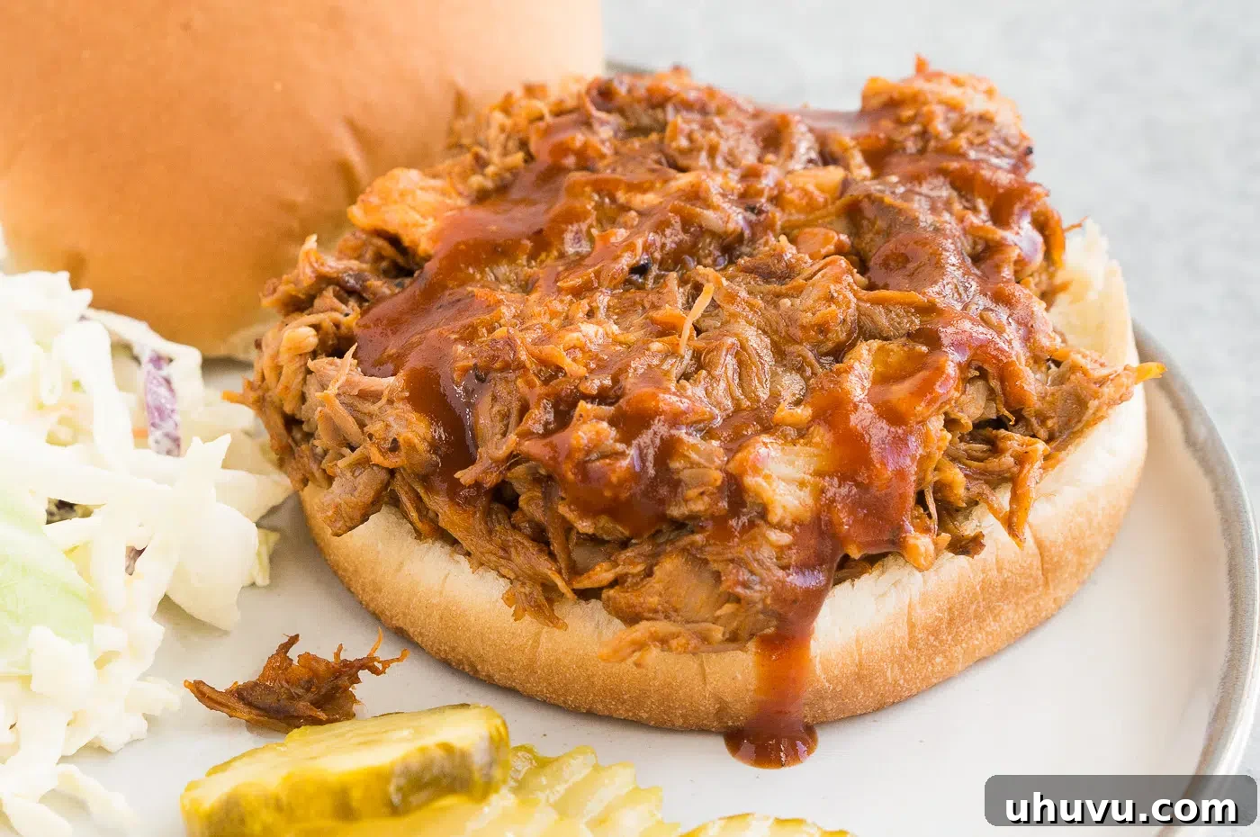 Effortless Instant Pot Pulled Pork 3 bbq pulled pork served on a bun