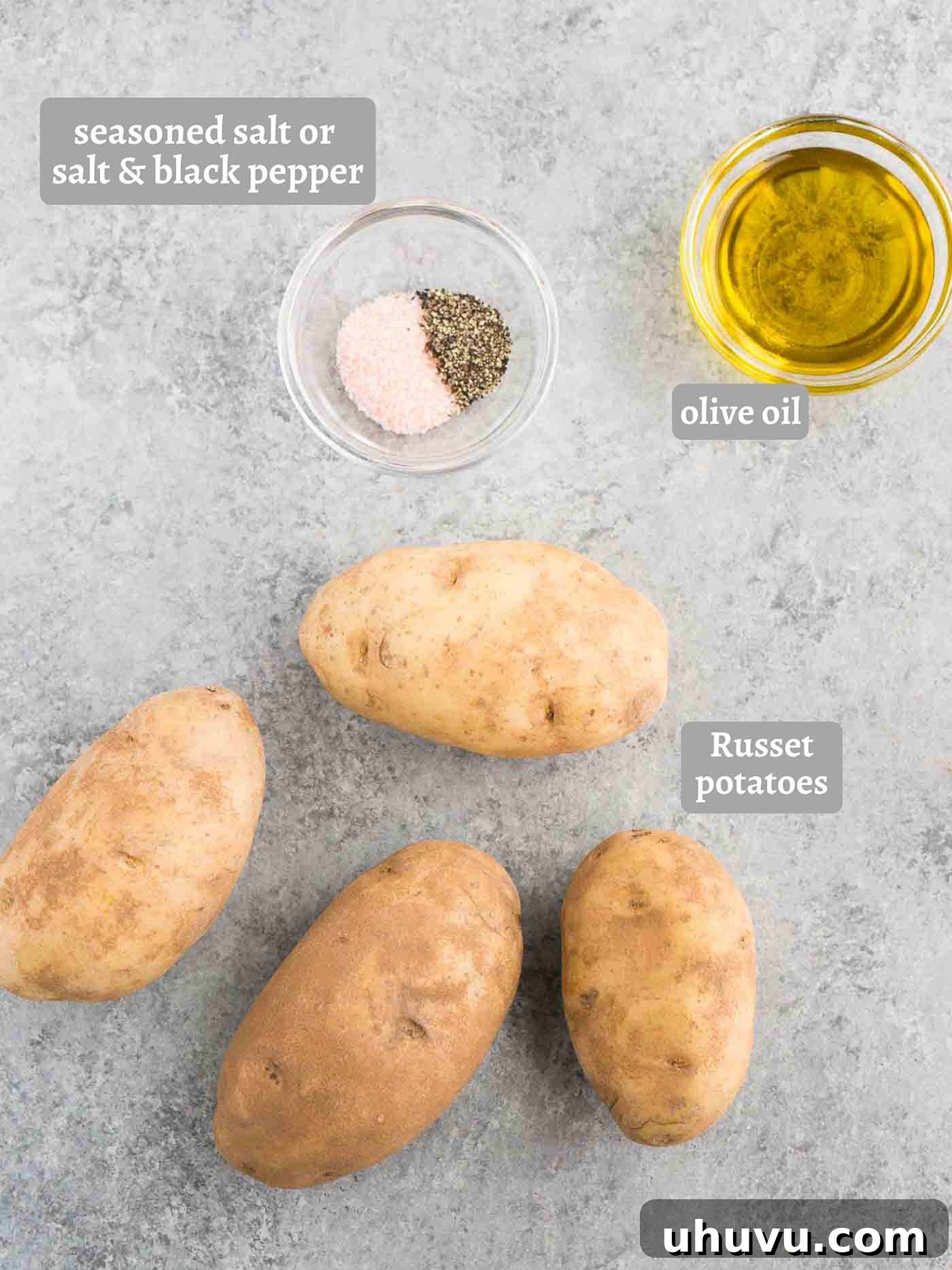 Crispy Homestyle Fries 4 Raw potato ingredients for baked French fries laid out on a board