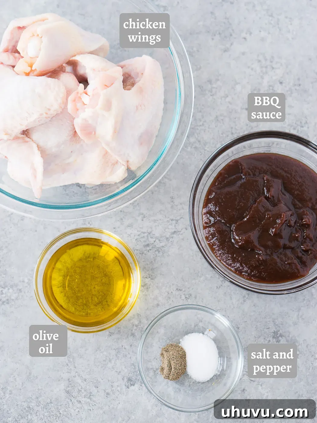 Ingredients for baked chicken wings with BBQ sauce laid out