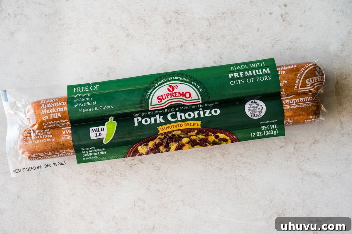 Chorizo Uncovered A Deep Dive into the Spicy Sausage 3 A vacuum-sealed package of Mexican pork chorizo on a wooden table, showcasing its raw state.