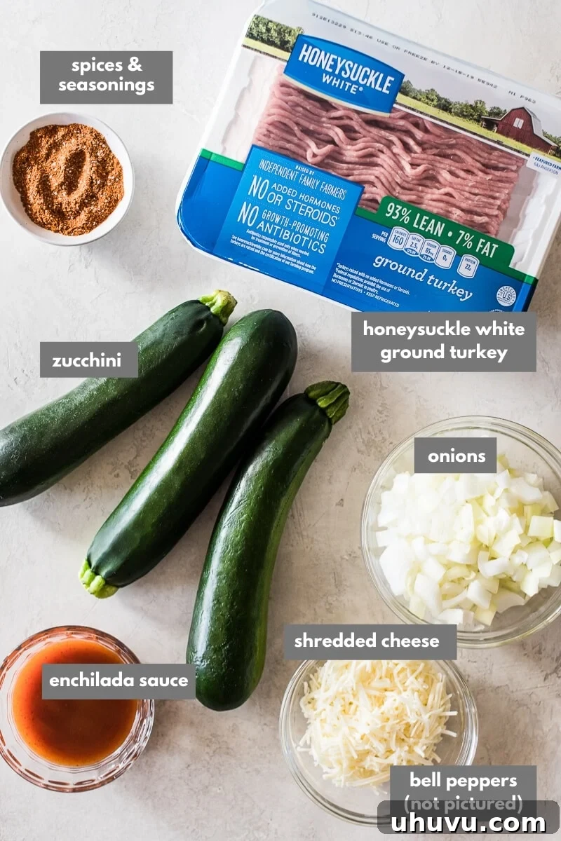 Southwestern Zucchini Roll-Ups 3 A vibrant display of zucchini enchilada ingredients laid out on a kitchen counter.