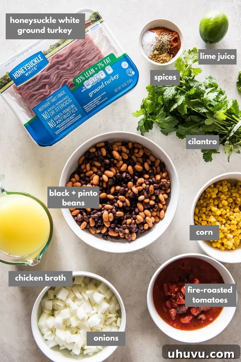 Crockpot Fiesta Taco Soup 3 Collection of fresh ingredients for Slow Cooker Taco Soup, including ground turkey, canned beans, corn, and spices