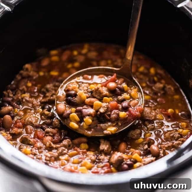 Slow Cooker Taco Soup in a crock pot, ready to be served