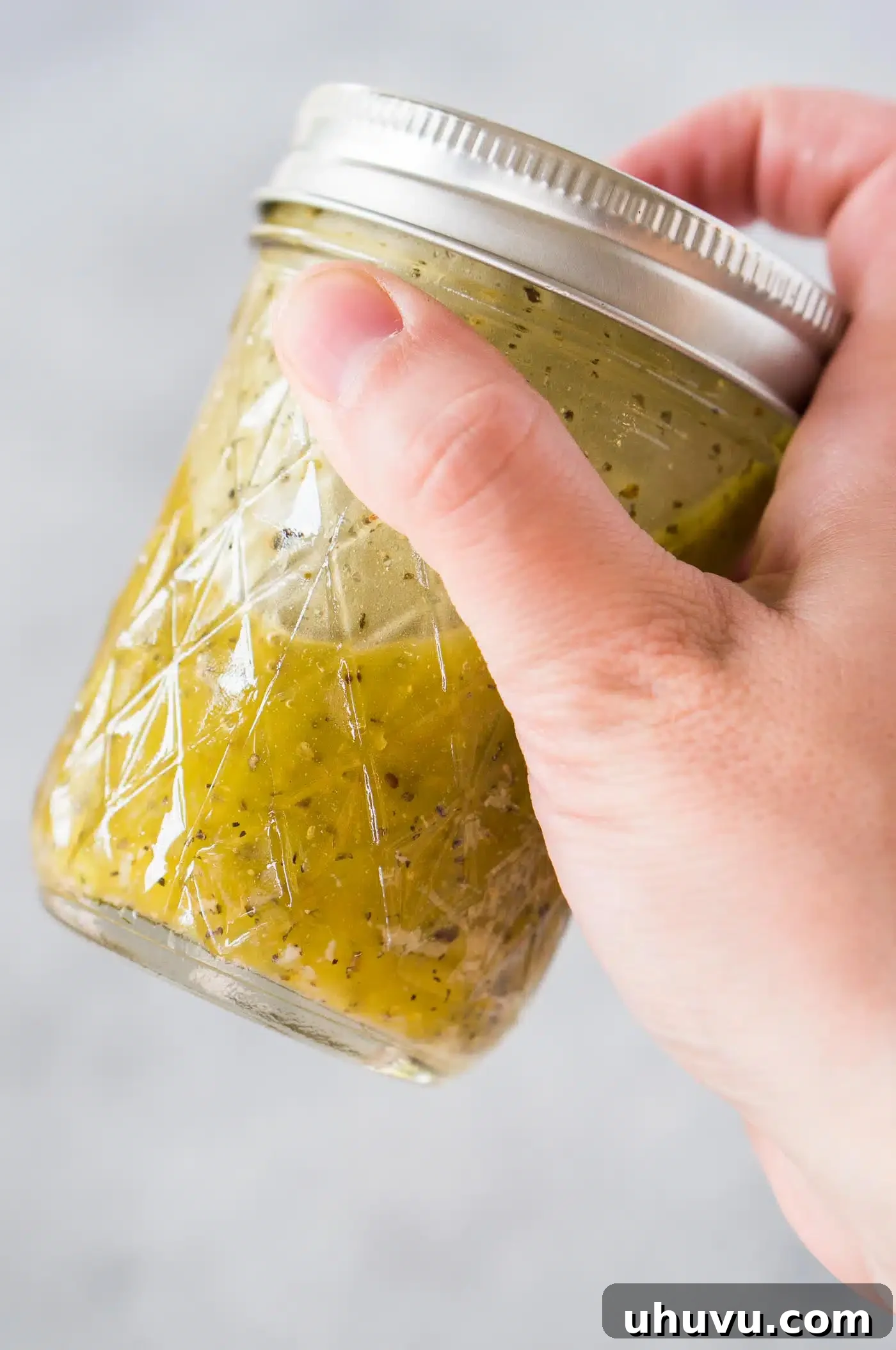 Bright Italian Herb Vinaigrette 5 making Italian vinaigrette in a jar by shaking