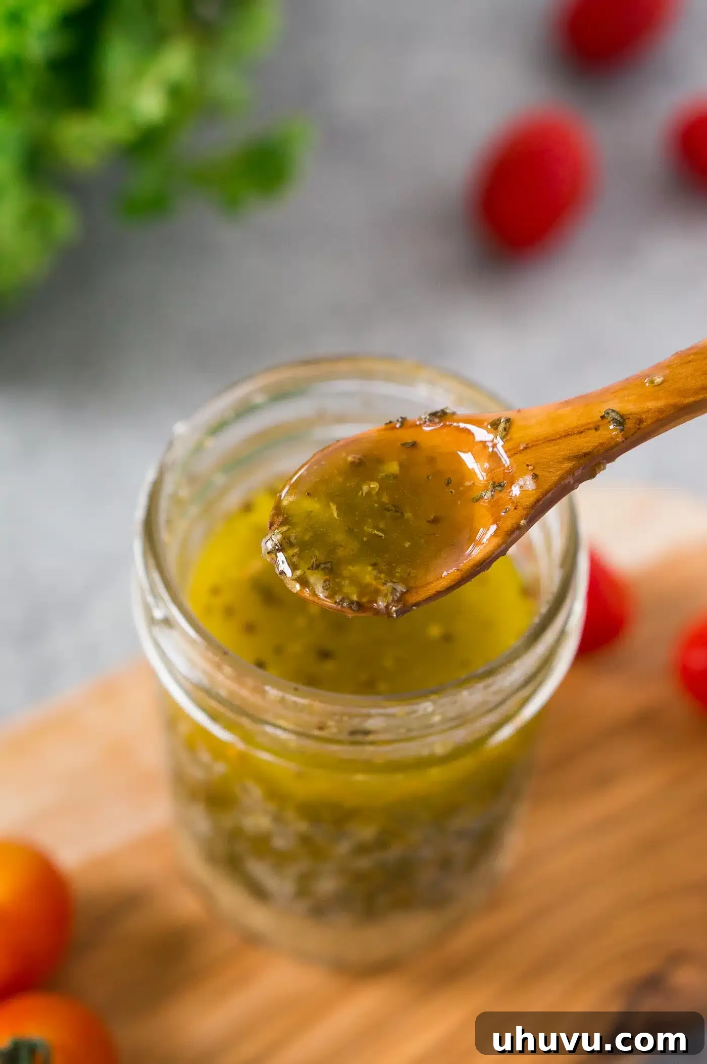 Bright Italian Herb Vinaigrette 7 Italian dressing with olive oil, lemon juice, and seasonings in a jar