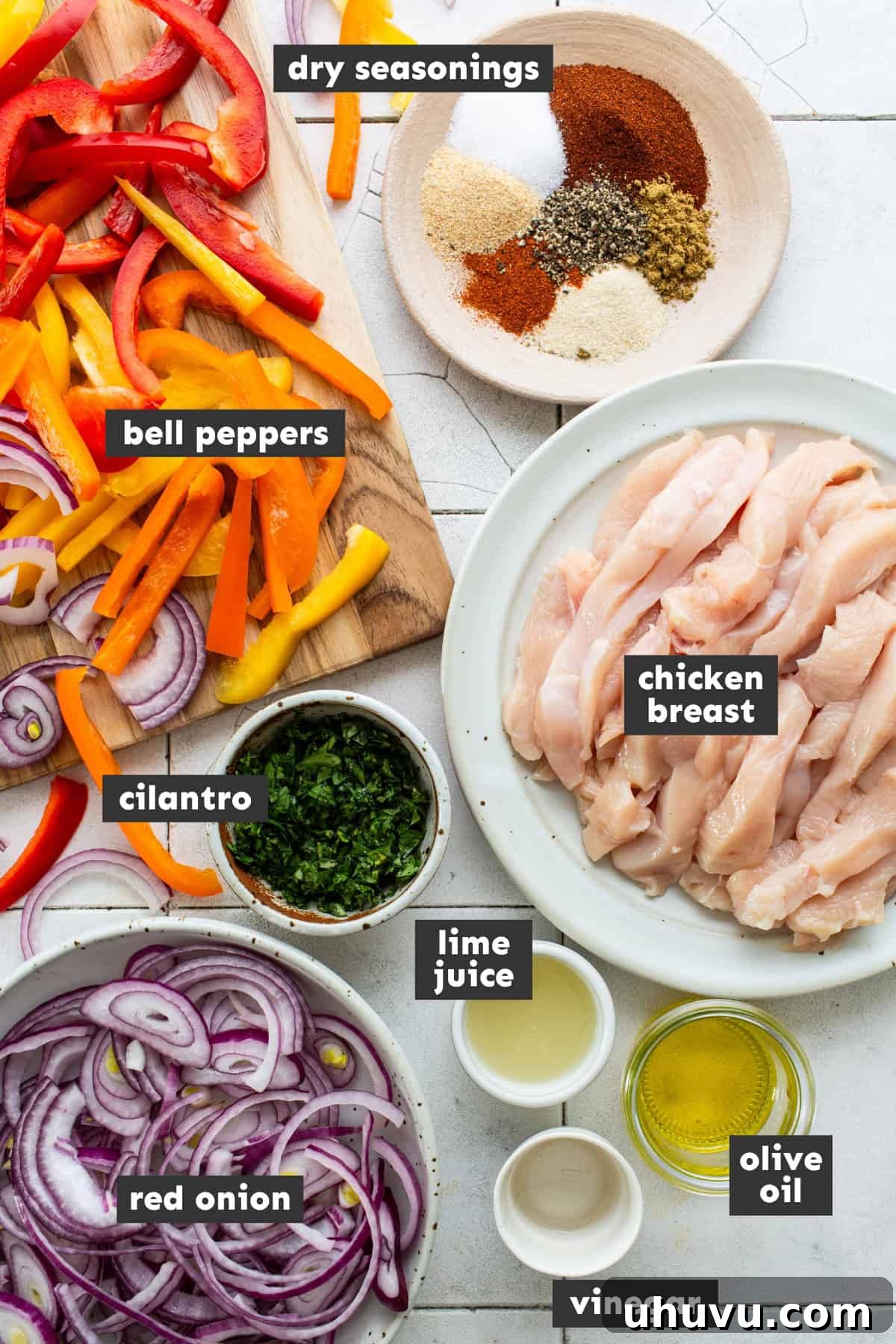 Sizzling Sheet Pan Chicken Fajitas 3 Ingredients for sheet pan chicken fajitas on a table.