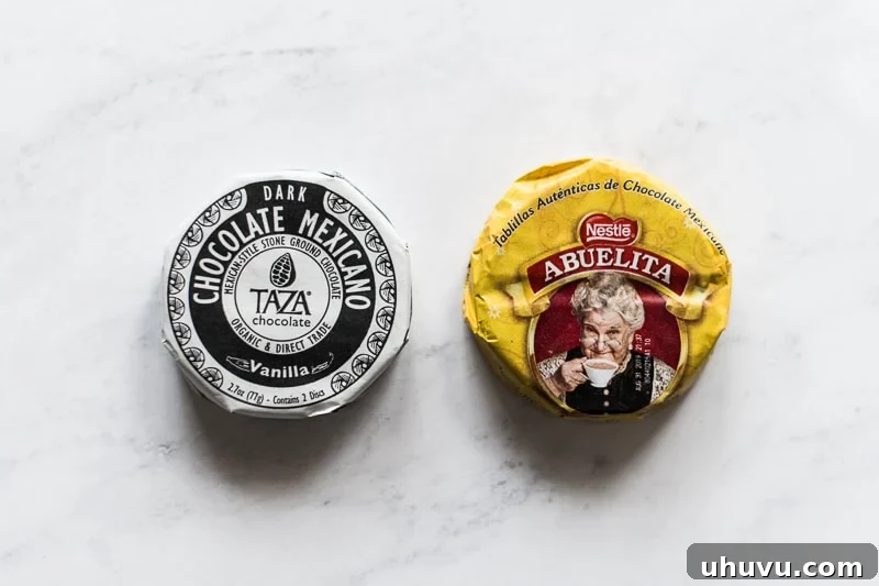 Mexican Chocolate Unveiled: Decoding Its Distinctive Flavor and Culinary Potential 3 Mexican chocolate discs on a table