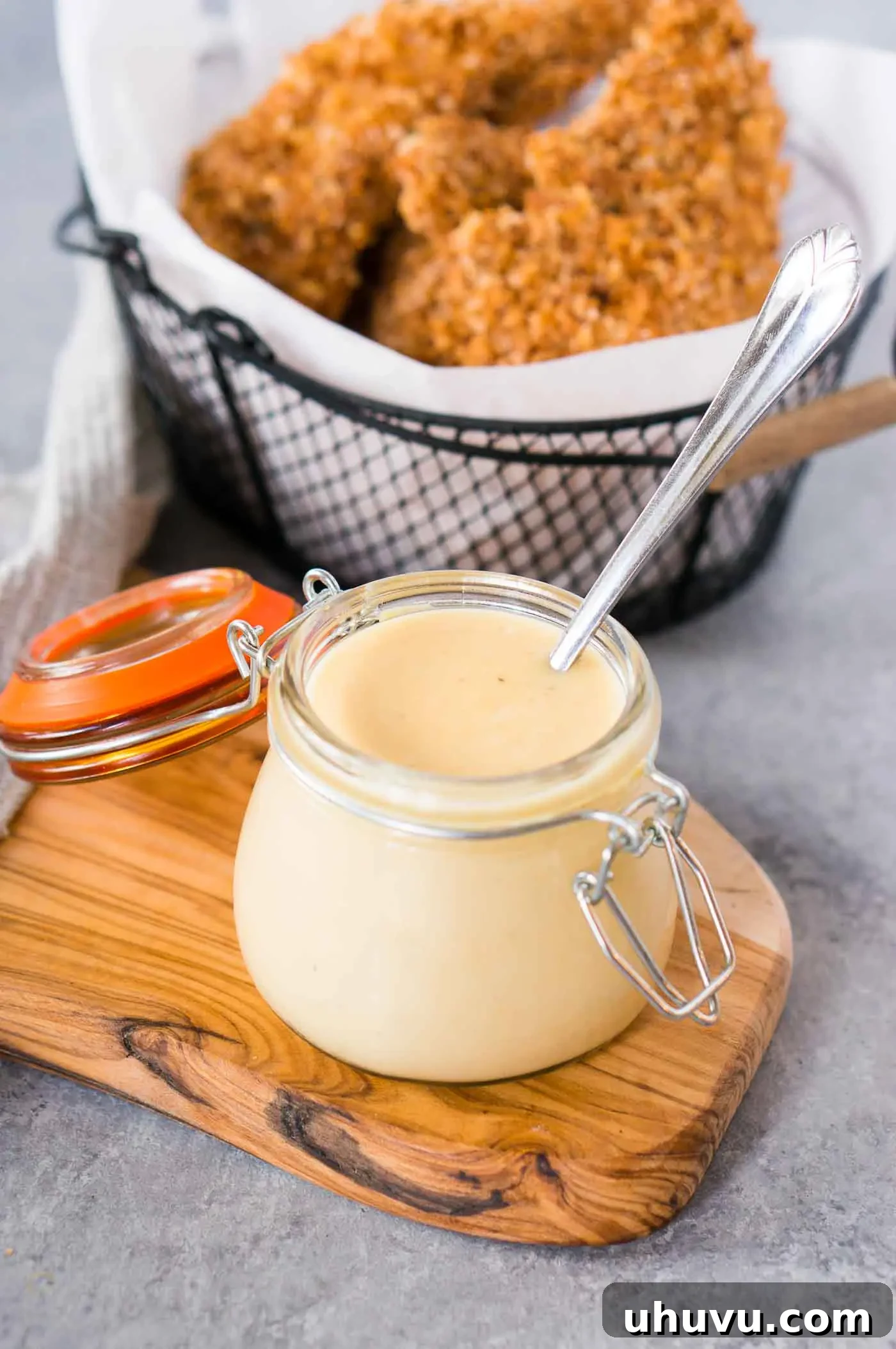 Honey Kissed Zing 6 homemade honey mustard recipe served with baked chicken tenders and fries