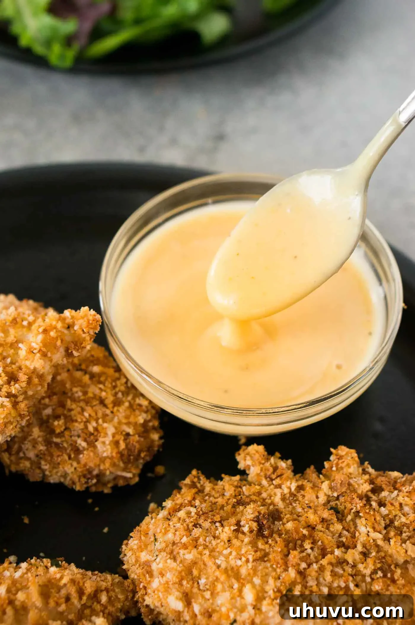 Honey Kissed Zing 7 homemade honey mustard dipping recipe in a small white bowl