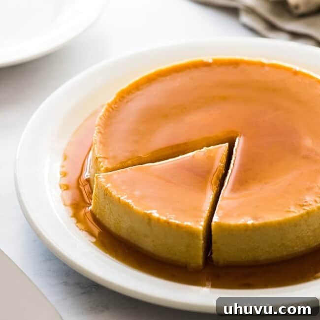 A delicious flan, sliced and ready for serving, highlighting its smooth texture and rich caramel.