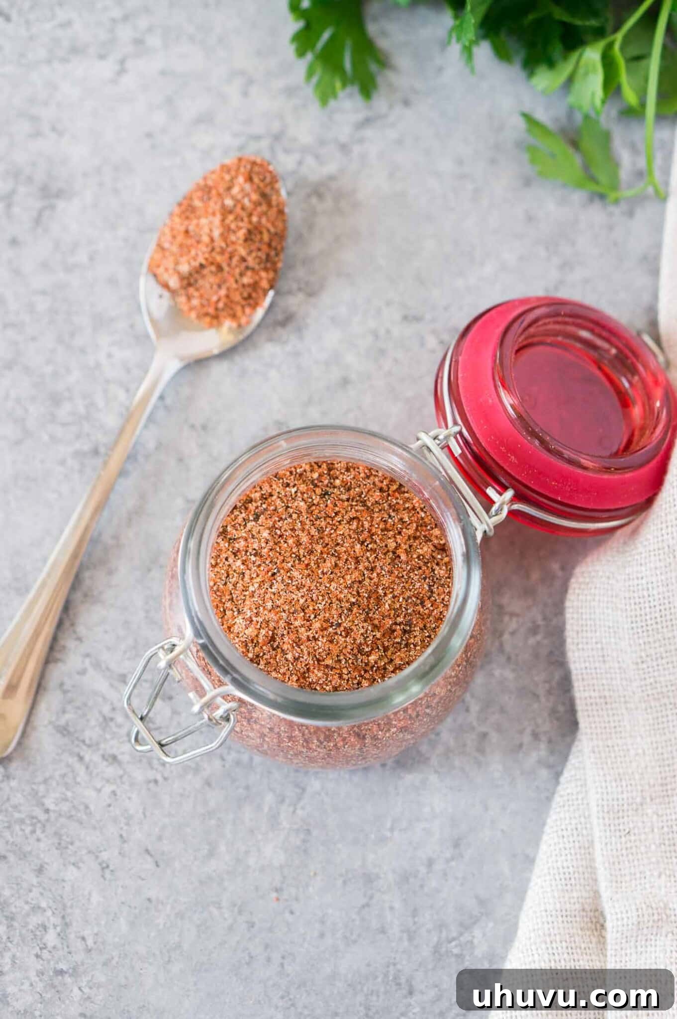 Signature Spice Blend 6 dry rub for chicken wings in a glass container