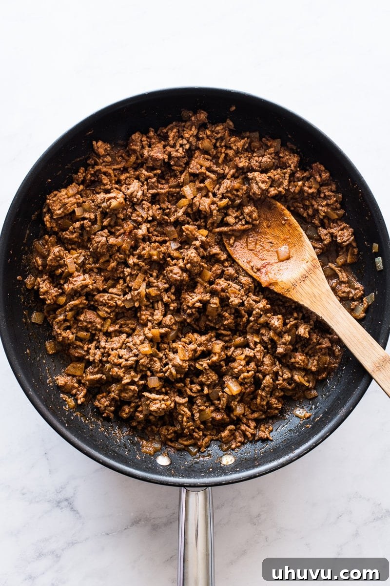 Golden Crispy Tacos 3 Seasoned ground beef in a skillet for hard shell tacos
