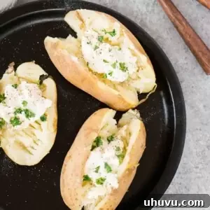 Speedy Instant Pot Baked Potatoes 8 instant pot baked potatoes served on a plate