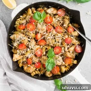 Chicken Pesto Pasta skillet with cherry tomatoes