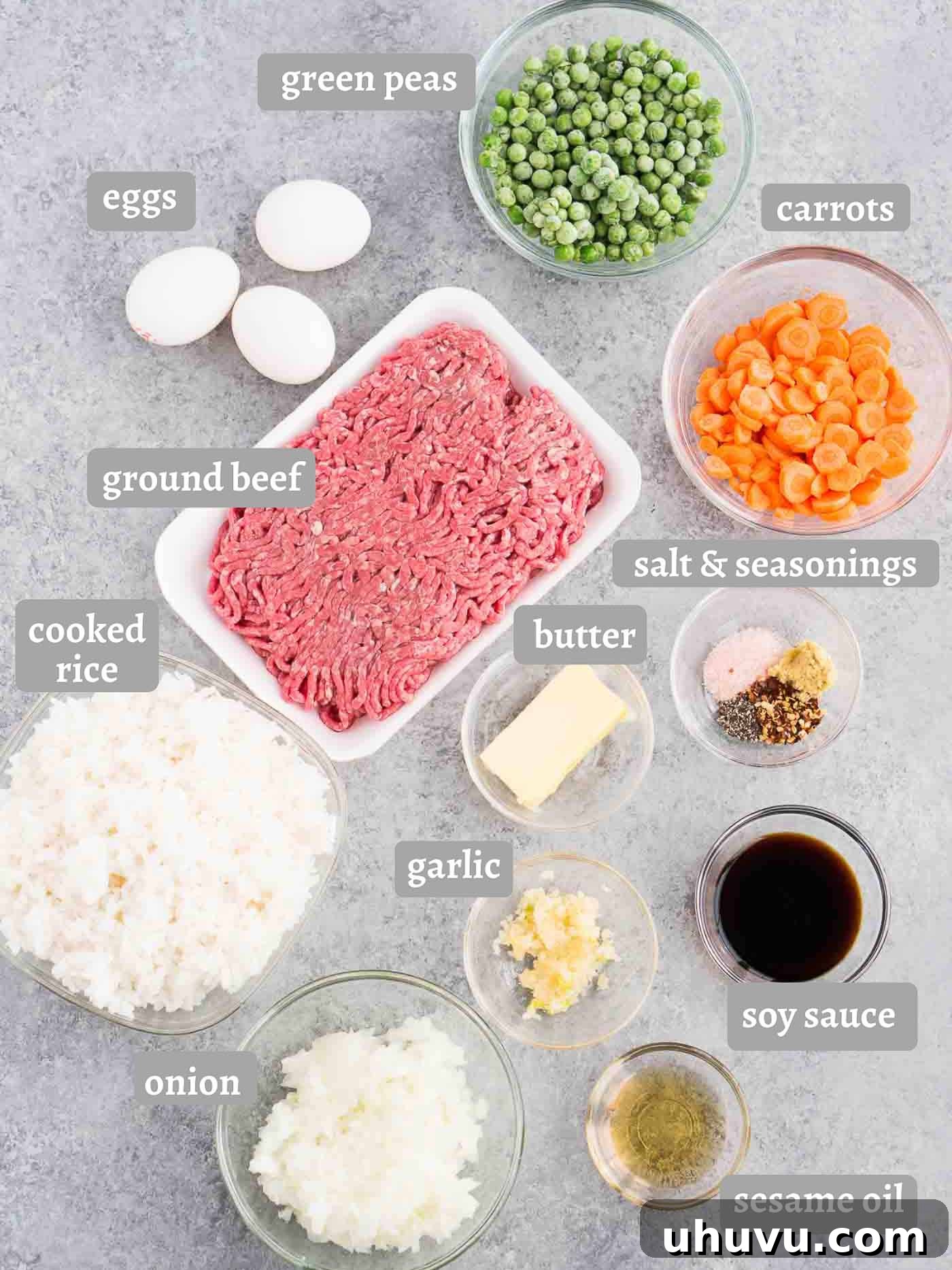 Wok-Fired Beef Rice 4 Arrangement of ingredients for ground beef fried rice: beef, vegetables, eggs, rice, sauces
