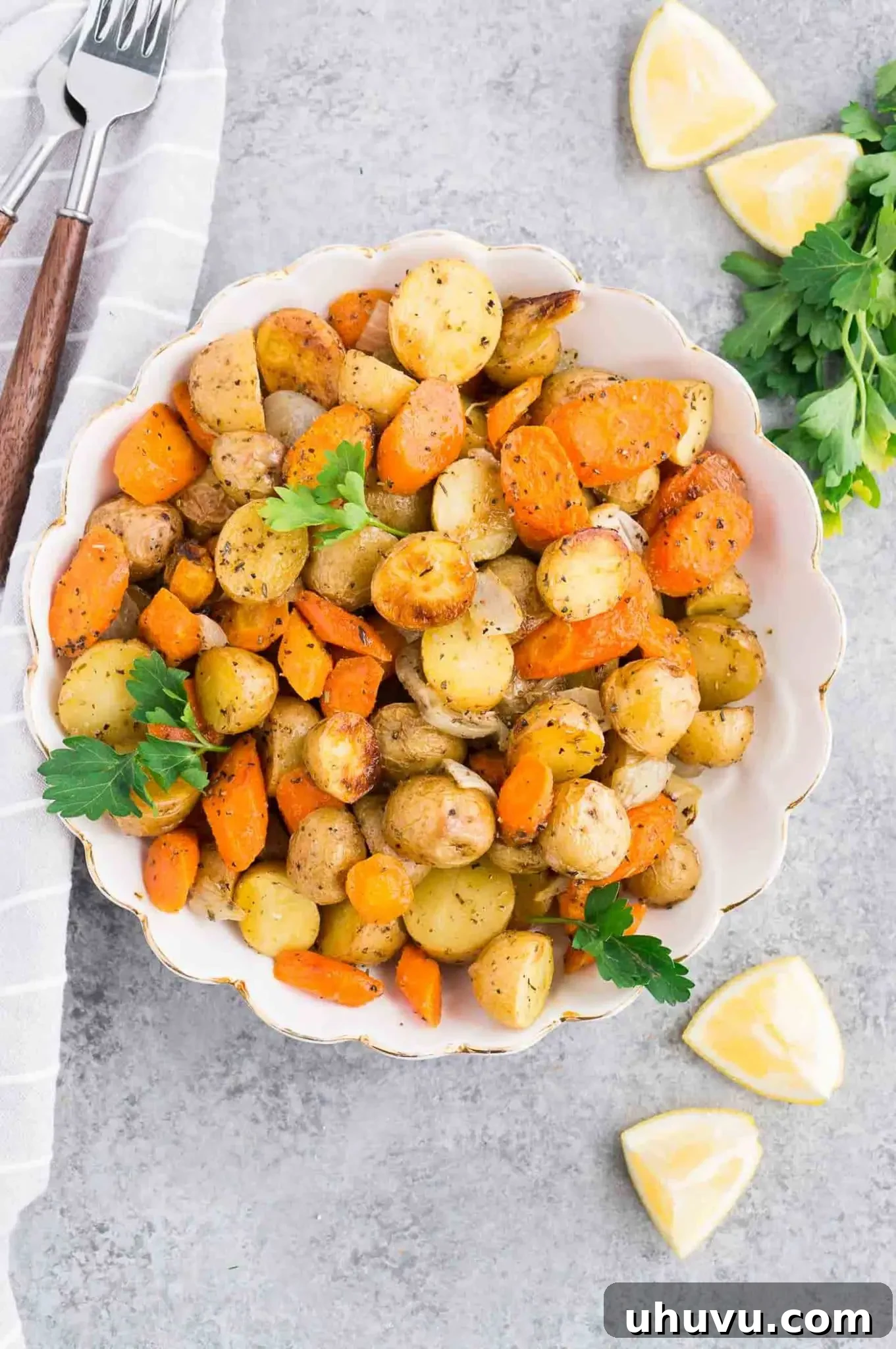 Golden Roasted Potatoes and Carrots 7 roasted carrots and potatoes in a serving bowl