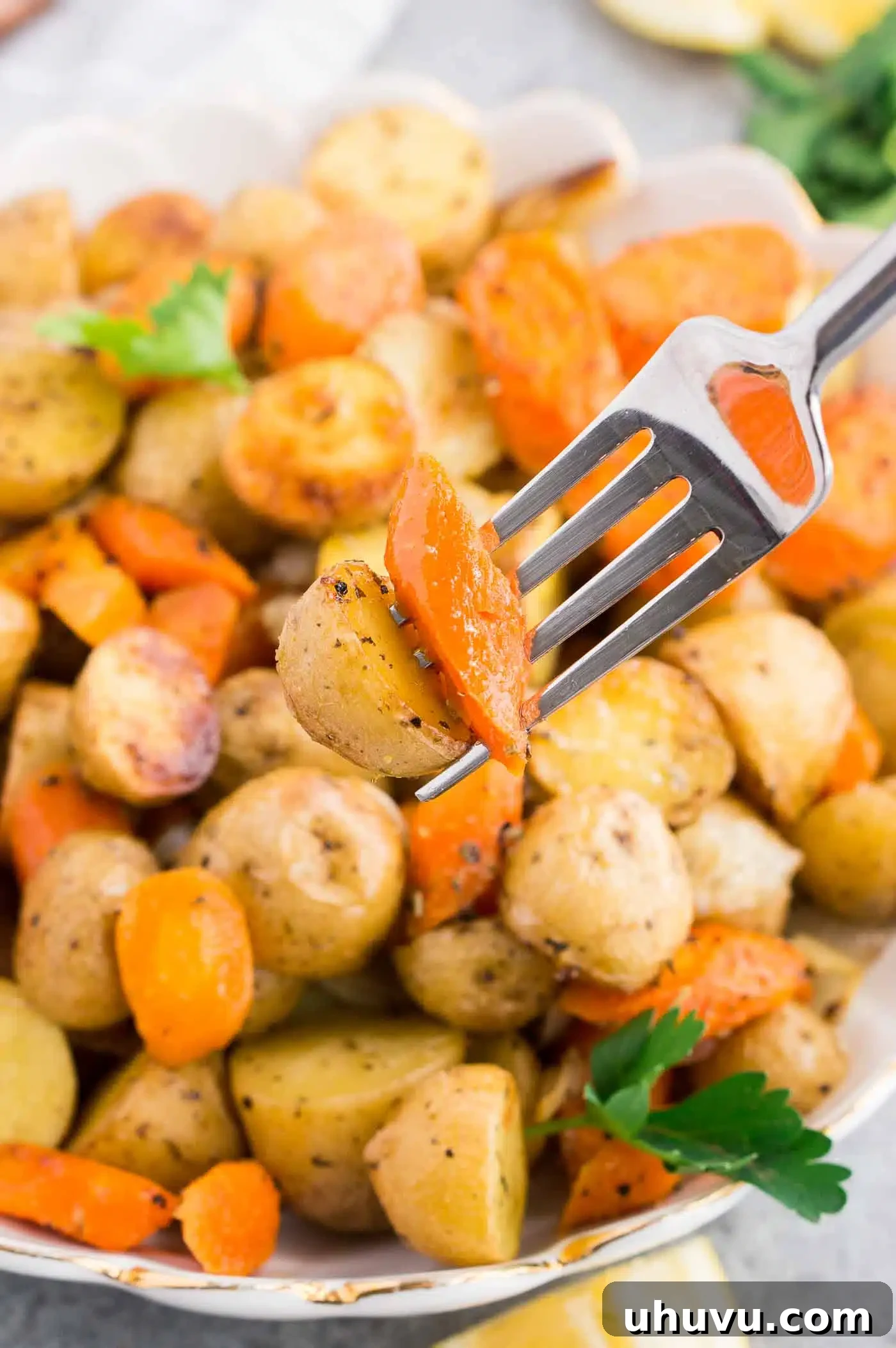 Golden Roasted Potatoes and Carrots 8 potato and carrot on a fork