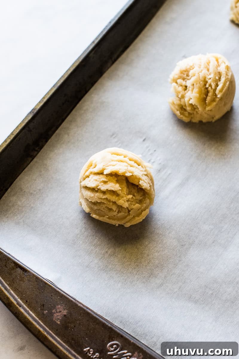 Effortless Funfetti Cookies 3 Raw sprinkle cookie dough on a baking sheet