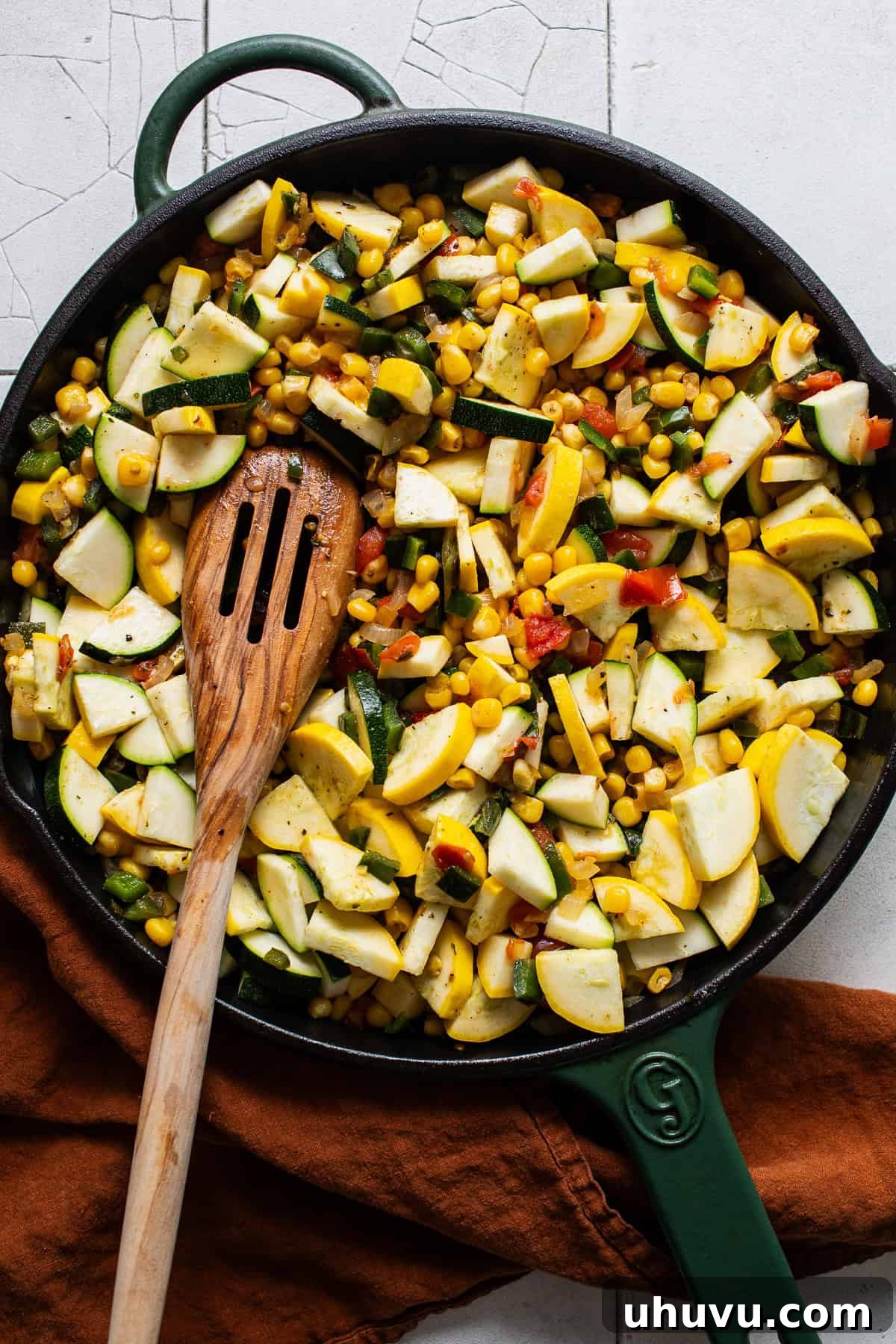 Garden Squash Medley 5 Zucchini and squash added to a skillet of vegetables for calabacitas.