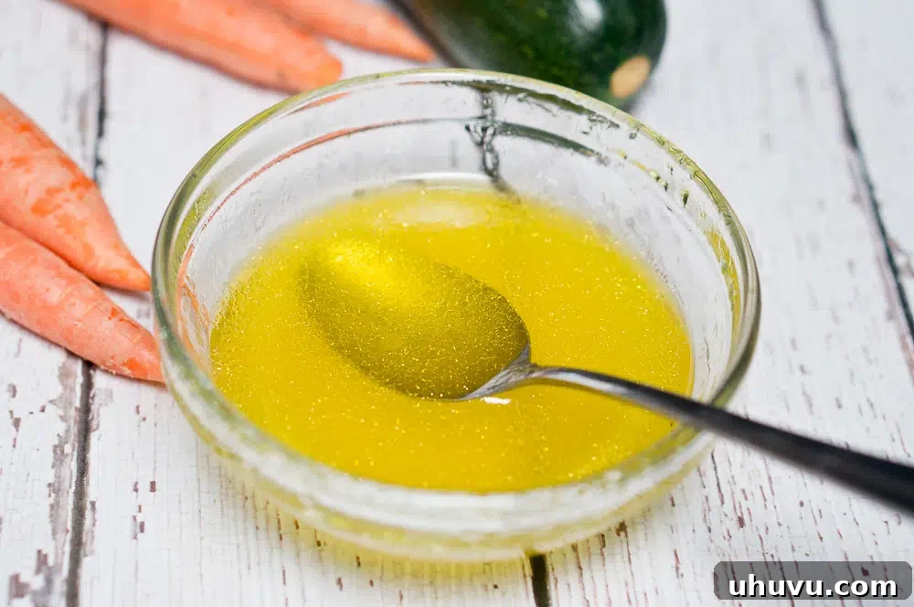 Preparing the honey lemon vinaigrette dressing for salad