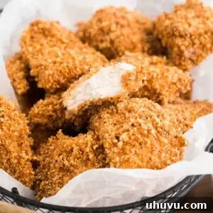 baked chicken nuggets in a basket, ready to serve