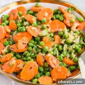 quick and easy peas and carrots recipe served in a bowl