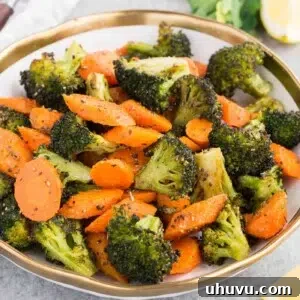 oven roasted broccoli and carrots in a bowl