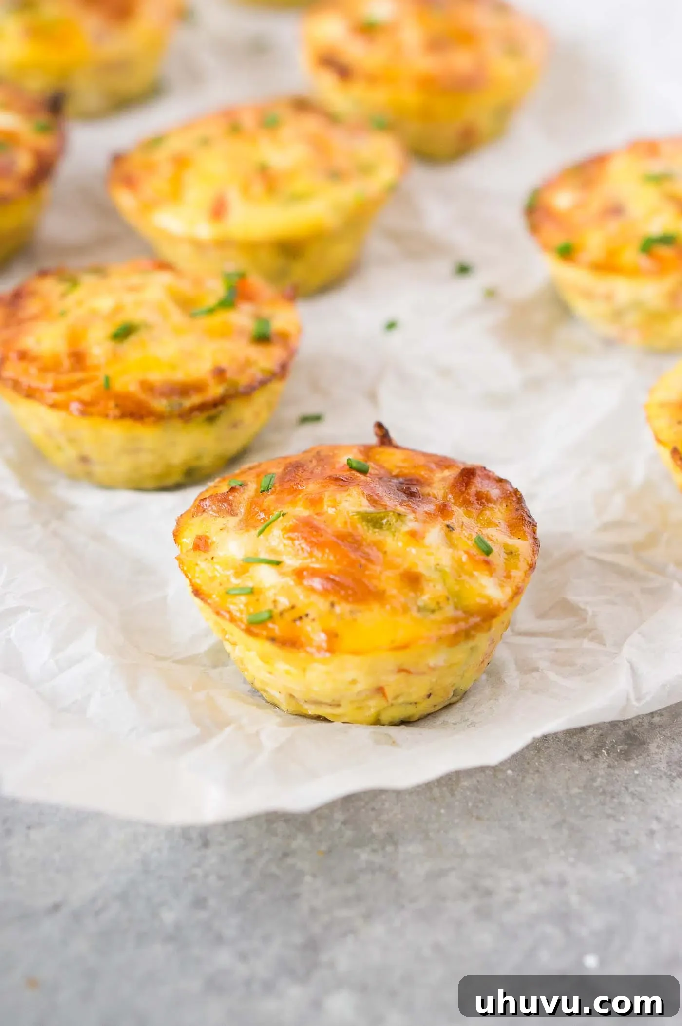 Close-up of fluffy breakfast muffins with ham and cheese