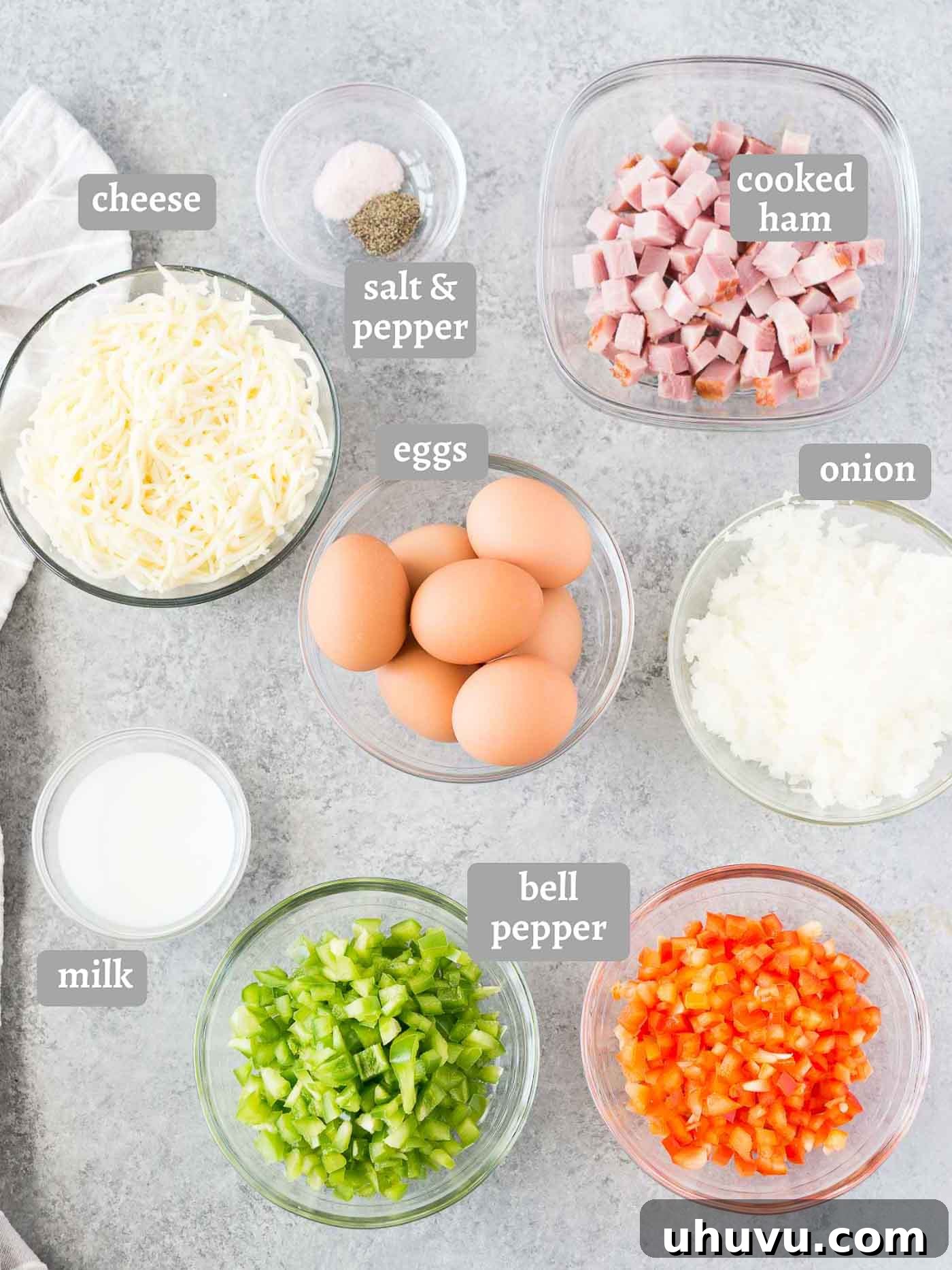 Savory Ham and Cheese Morning Muffins 4 Fresh ingredients laid out for making breakfast egg muffins with ham and cheese