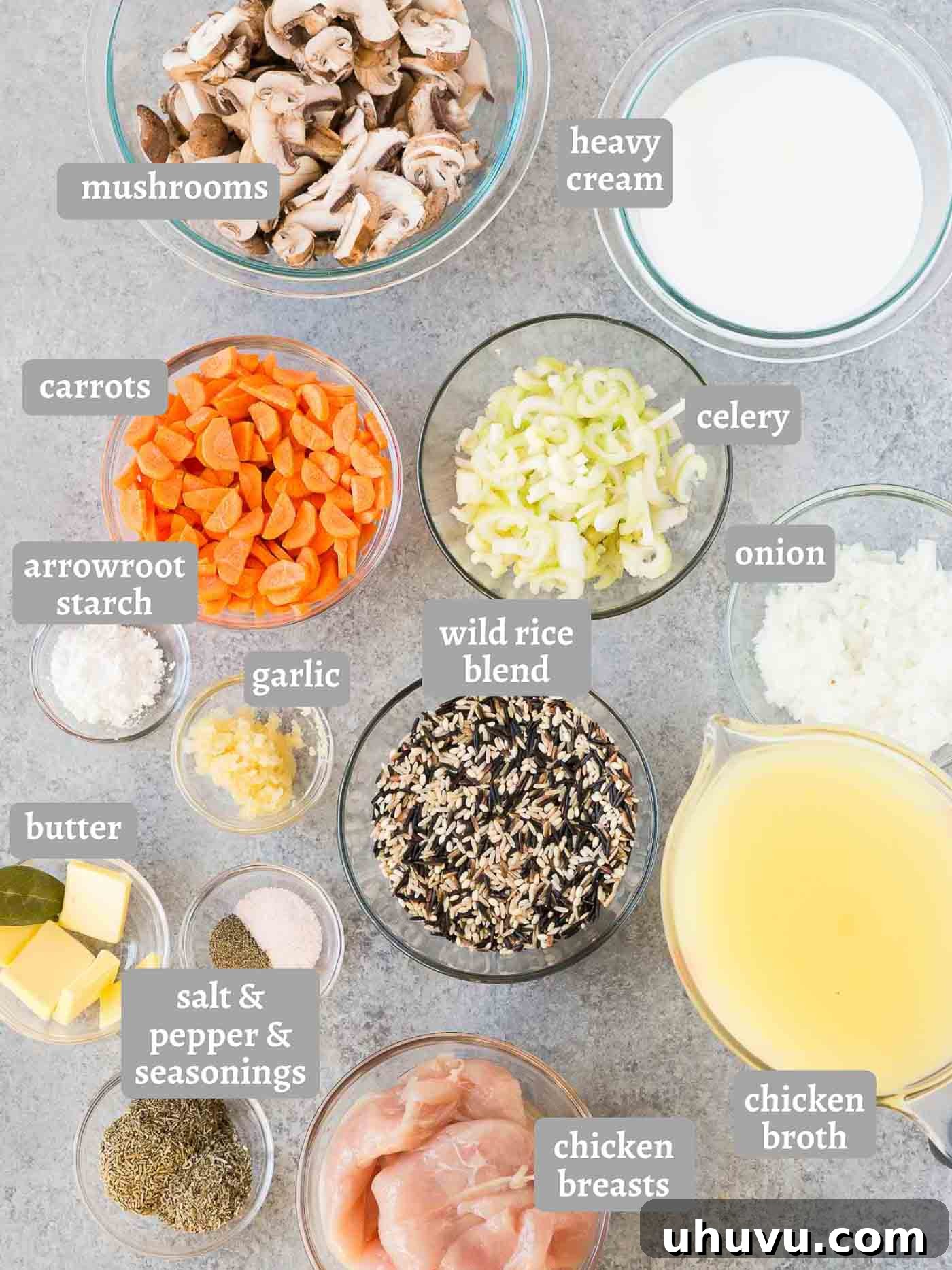 ingredients for chicken wild rice soup laid out on a table