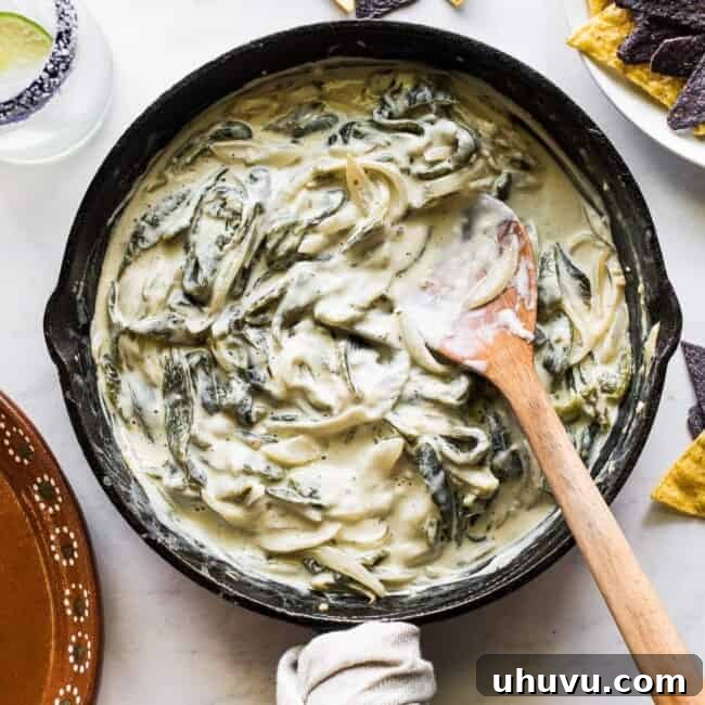 Rajas con crema in a skillet ready to be eaten.