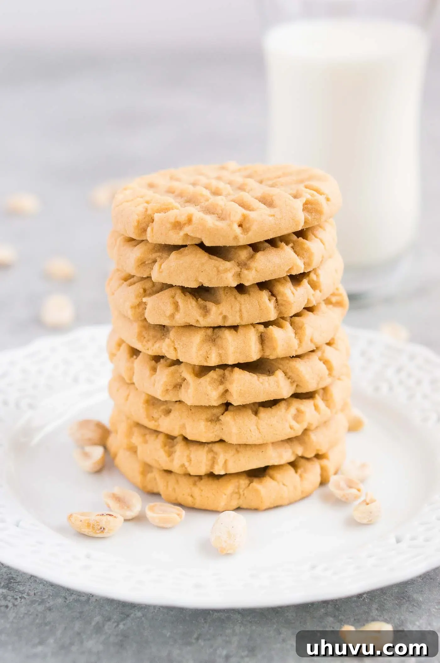 Irresistible Peanut Butter Bites 2 Stacked soft peanut butter cookies on a plate, tempting and ready to eat